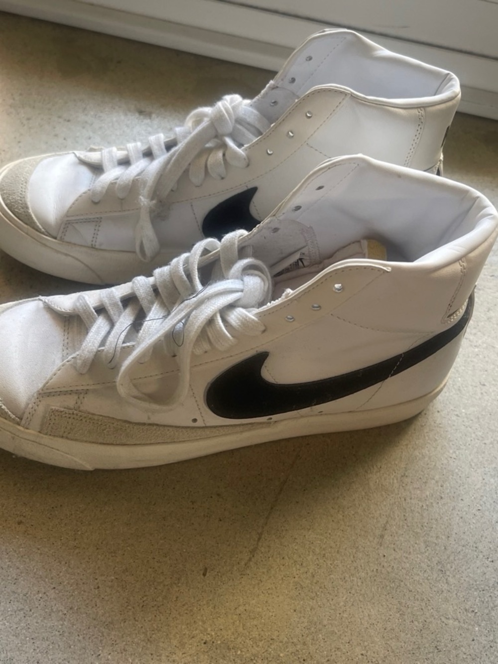 Nike Blazers Men’s High-Top Sneakers in White with Black Swoosh